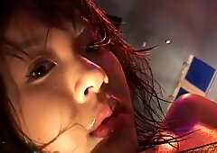 Pallid Asian nympho Harumi Nemoto shows her big boobs on camera