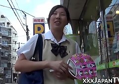 Nerdy Japanese schoolgirl with glasses teases in public