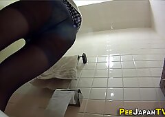 Asian slut pees in toilet