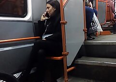 Hot MILF in black pantyhose in late tram