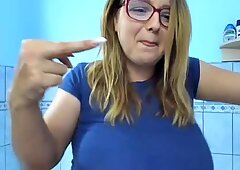 Busty blonde flashes her boobs